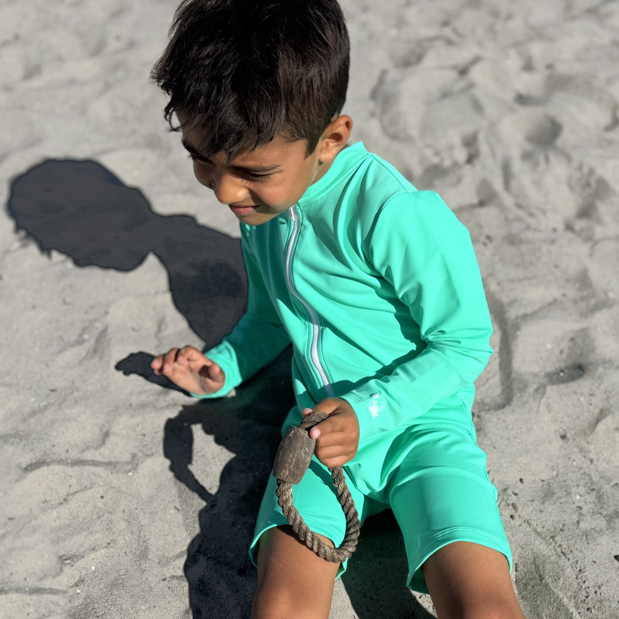 Petit Crabe Parrot Combi Sunsuit