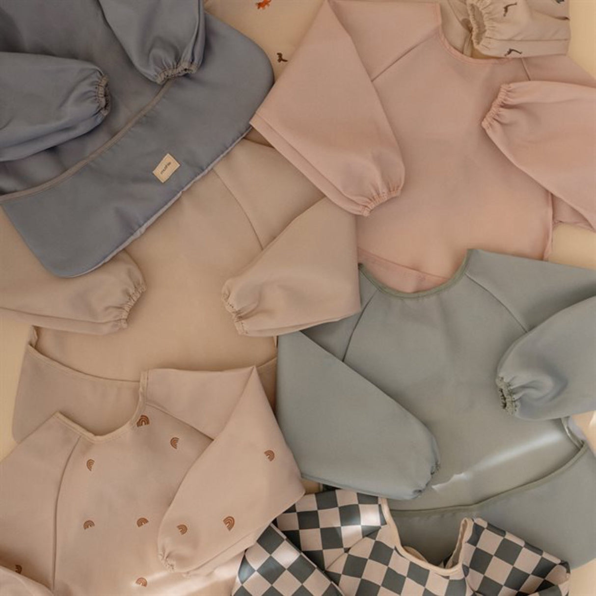 Mushie Dino ​​Long Sleeve Bib​