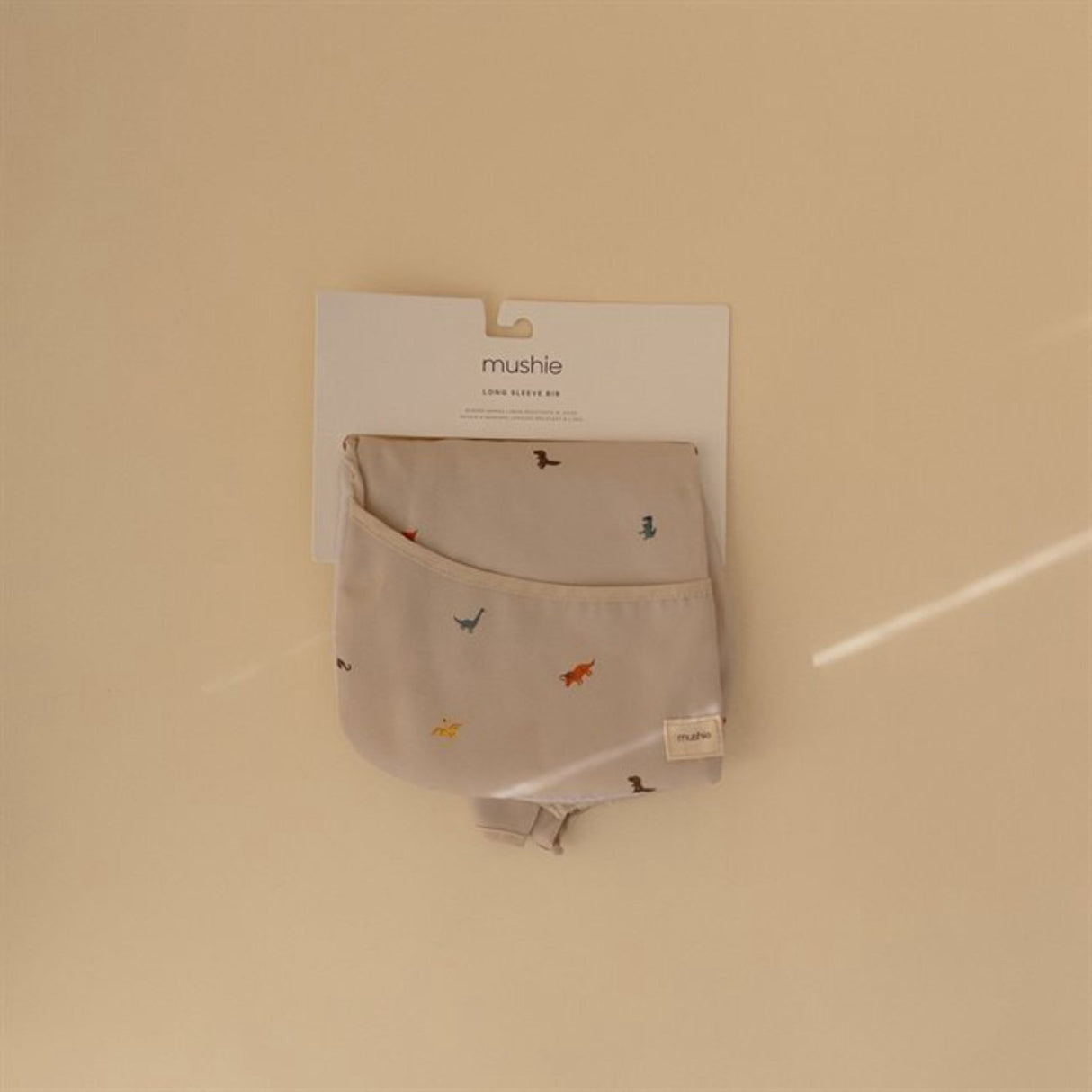 Mushie Dino ​​Long Sleeve Bib​