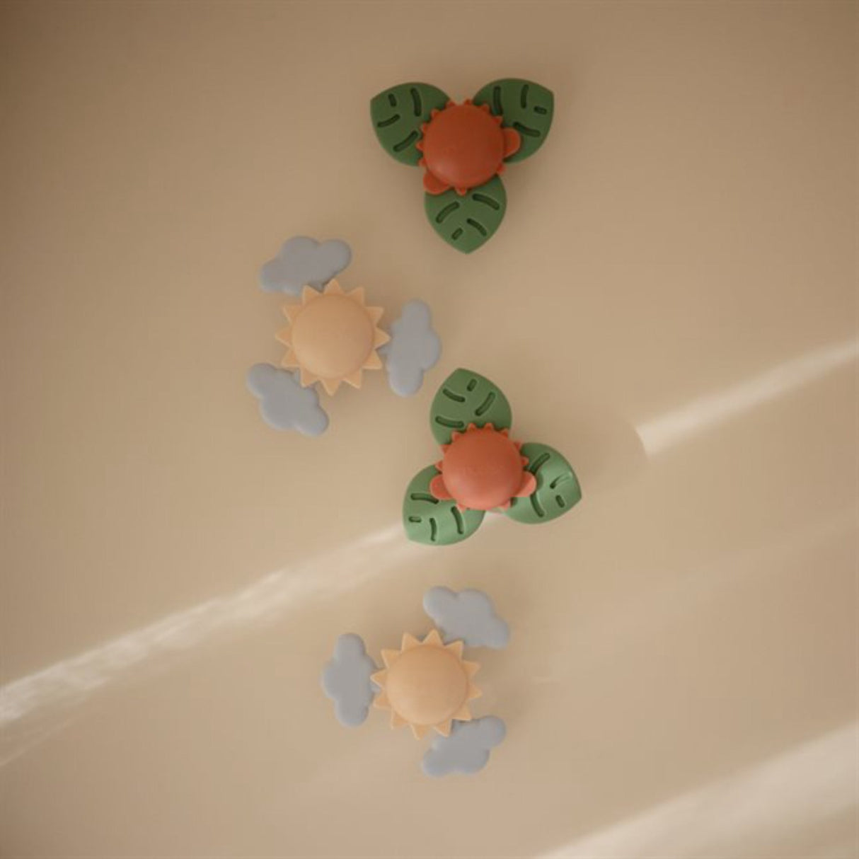 Mushie Dino Suction Spinner Toy